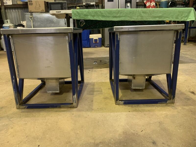 Pair of tapered steel hoppers on stands